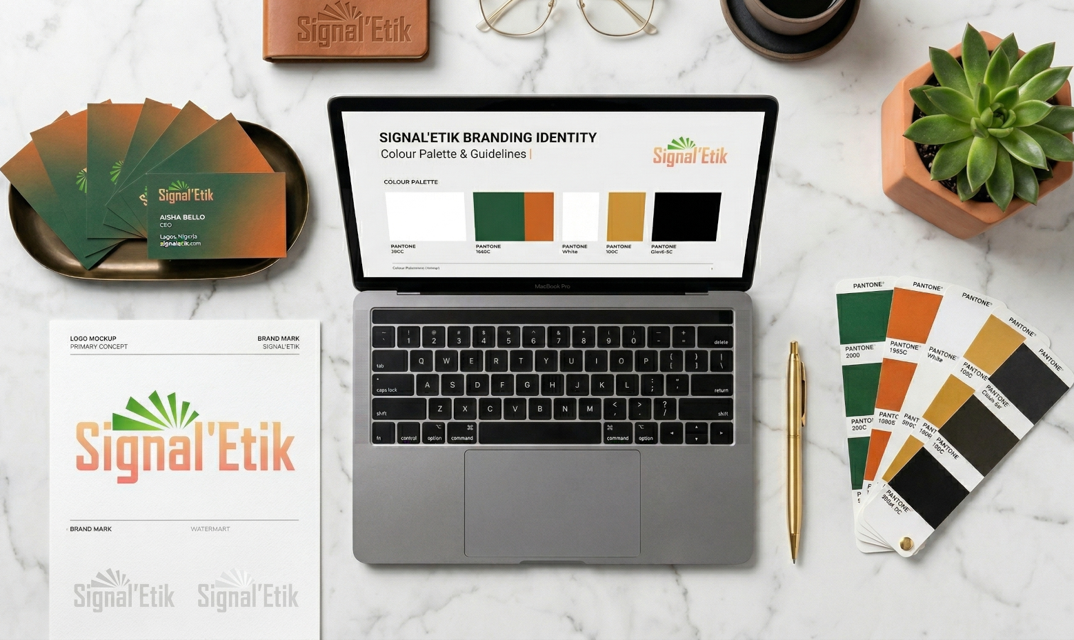 Branding Signal'Etik - charte graphique, logo, palette de couleurs et materiaux de communication sur bureau en marbre